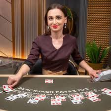 Mobile device displaying casino game show interface with chat features and live streaming optimized for Bangladesh users